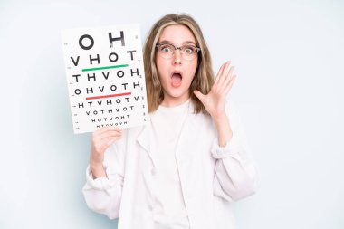 caucasian pretty woman smiling happily with friendly and  offering and showing a concept. optical vision test concept