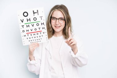 caucasian pretty woman feeling happy,giving a big shout out with hands next to mouth. optical vision test concept