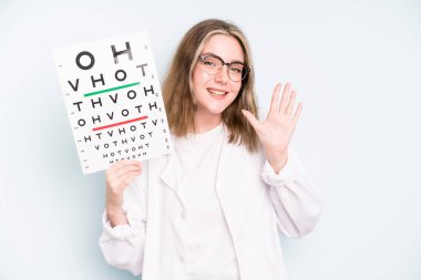 caucasian pretty woman feeling confused and puzzled, showing you are insane. optical vision test concept