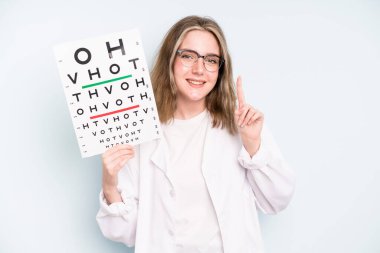 caucasian pretty woman smiling happily, waving hand, welcoming and greeting you. optical vision test concept