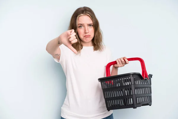 Caucasian Pretty Woman Feeling Cross Showing Thumbs Empty Shopping Basket — Foto Stock