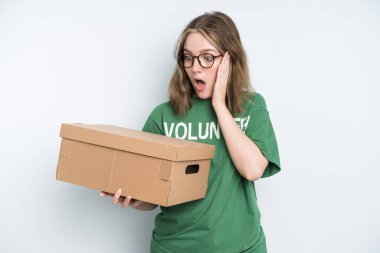 caucasian pretty woman thinking, feeling doubtful and confused. volunteer and donation concept