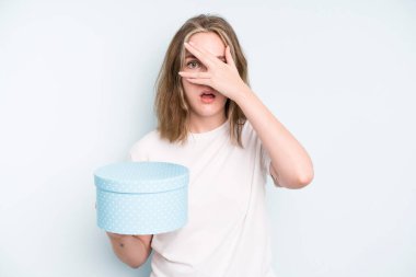 caucasian pretty woman feeling happy and pointing to self with an excited. gift box concept