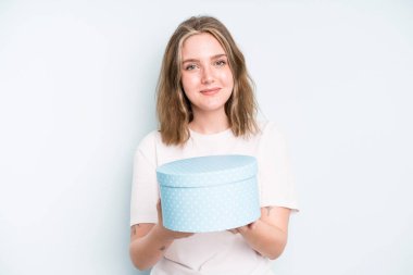 caucasian pretty woman looking happy, astonished and surprised. gift box concept