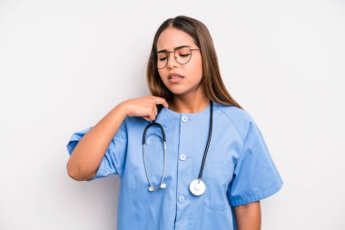 hispanic pretty woman feeling stressed, anxious, tired and frustrated. medicine student concept