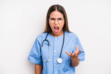hispanic pretty woman looking angry, annoyed and frustrated. medicine student concept