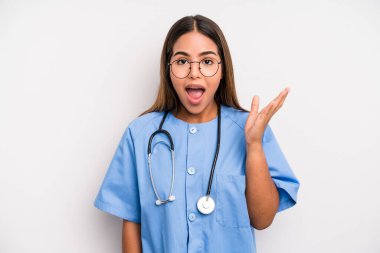 hispanic pretty woman feeling happy, surprised realizing a solution or idea. medicine student concept