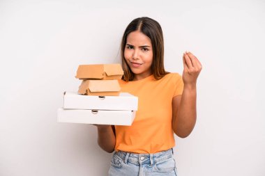 hispanic pretty woman making capice or money gesture, telling you to pay. fast food and take away concept