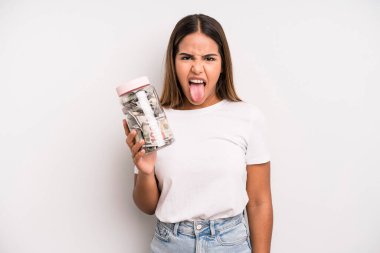 hispanic pretty woman feeling disgusted and irritated and tongue out. dollar banknotes savings concept