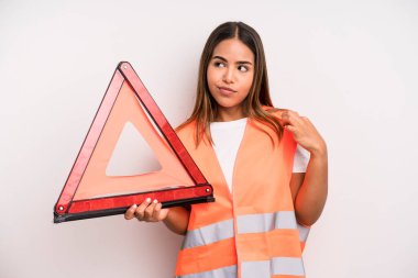 hispanic pretty woman looking arrogant, successful, positive and proud. car accident emergency concept