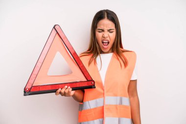 hispanic pretty woman shouting aggressively, looking very angry. car accident emergency concept