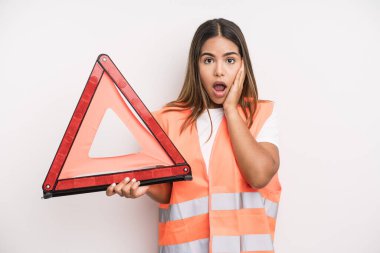 hispanic pretty woman feeling shocked and scared. car accident emergency concept