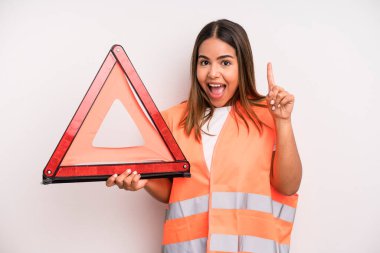 hispanic pretty woman feeling like a happy and excited genius after realizing an idea. car accident emergency concept