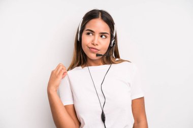 hispanic pretty woman looking arrogant, successful, positive and proud. telemarketer concept