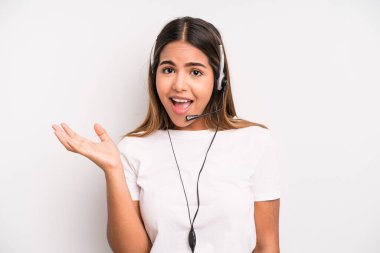 hispanic pretty woman feeling happy, surprised realizing a solution or idea. telemarketer concept