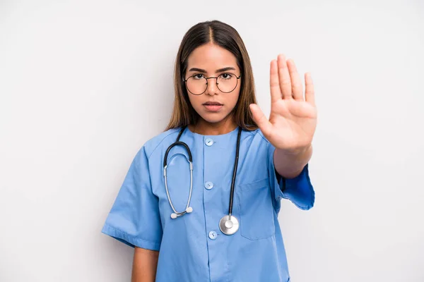 Hispanic Pretty Woman Looking Serious Showing Open Palm Making Stop — Stok fotoğraf