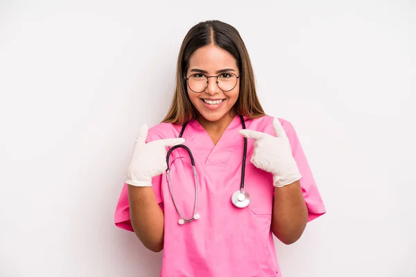 Hispanic Pretty Woman Feeling Happy Pointing Self Excited Medicine Student — Stockfoto