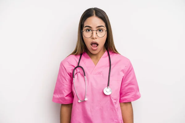Hispanic Pretty Woman Looking Very Shocked Surprised Medicine Student Concept — Zdjęcie stockowe