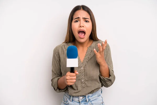 Hispanic Pretty Woman Looking Desperate Frustrated Stressed Presenter Microphone Concept —  Fotos de Stock