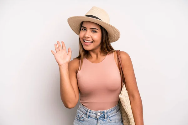 Hispanic Pretty Woman Smiling Happily Waving Hand Welcoming Greeting You — Stockfoto