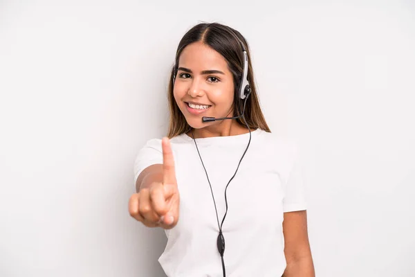 Hispanic Pretty Woman Smiling Proudly Confidently Making Number One Telemarketer — Fotografia de Stock
