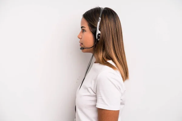 Hispanic Pretty Woman Profile View Thinking Imagining Daydreaming Telemarketer Concept — Stok fotoğraf