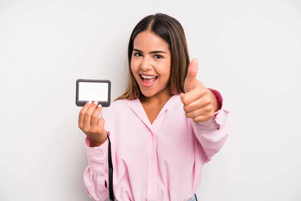 Hispanic Pretty Woman Feeling Proud Smiling Positively Thumbs Pass Card — Stock Fotó
