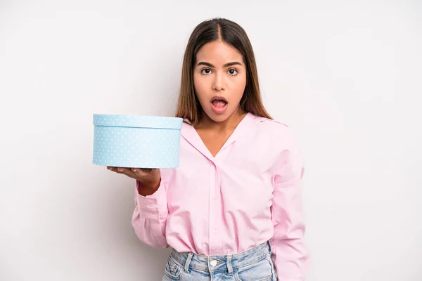 Hispanic Pretty Woman Looking Very Shocked Surprised Gift Box Concept —  Fotos de Stock