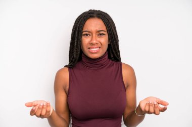 black young adult woman feeling clueless and confused, not sure which choice or option to pick, wondering