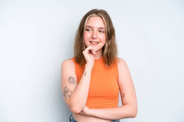 caucasian pretty woman smiling with a happy, confident expression with hand on chin, wondering and looking to the side