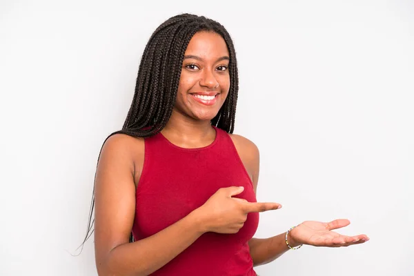 Black Young Adult Woman Smiling Feeling Happy Carefree Satisfied Pointing — Stock Photo, Image