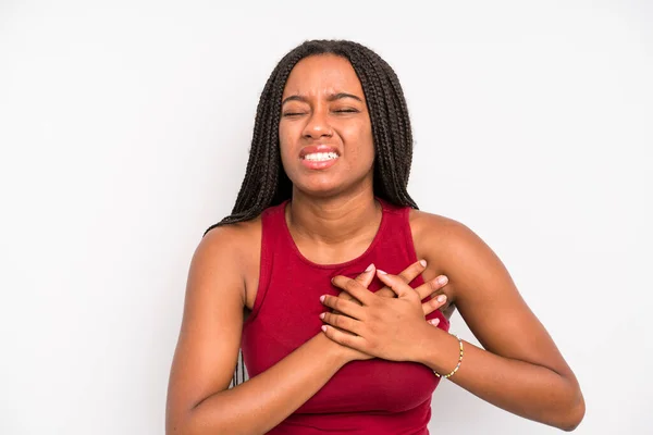 Black Young Adult Woman Looking Sad Hurt Heartbroken Holding Both — Zdjęcie stockowe