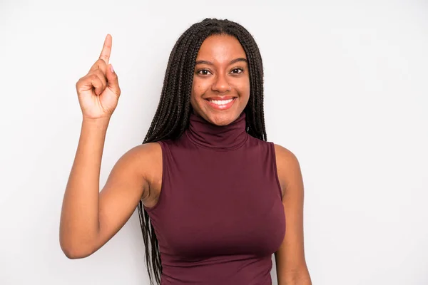 Black Young Adult Woman Smiling Cheerfully Happily Pointing Upwards One — Stockfoto