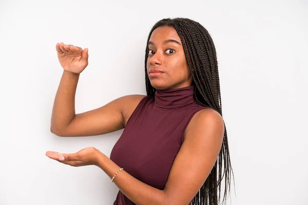 Black Young Adult Woman Holding Object Both Hands Side Copy — Stockfoto