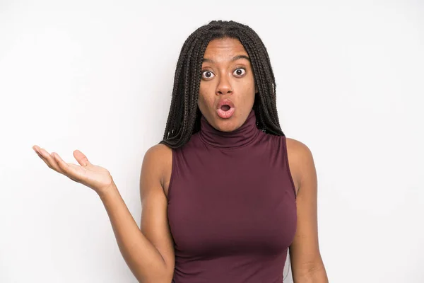 Black Young Adult Woman Looking Surprised Shocked Jaw Dropped Holding — Stockfoto