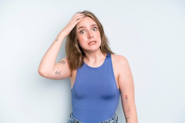 caucasian pretty woman panicking over a forgotten deadline, feeling stressed, having to cover up a mess or mistake