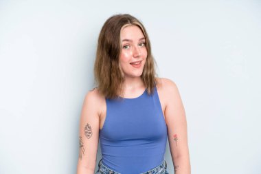caucasian pretty woman with a big, friendly, carefree smile, looking positive, relaxed and happy, chilling