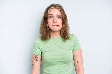 caucasian pretty woman feeling clueless, confused and uncertain about which option to pick, trying to solve the problem