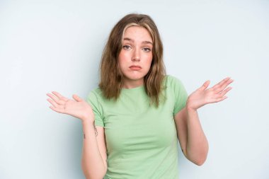caucasian pretty woman feeling puzzled and confused, unsure about the correct answer or decision, trying to make a choice