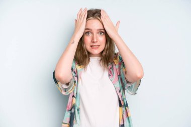 caucasian pretty woman feeling stressed and anxious, depressed and frustrated with a headache, raising both hands to head