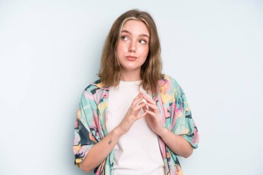 caucasian pretty woman scheming and conspiring, thinking devious tricks and cheats, cunning and betraying