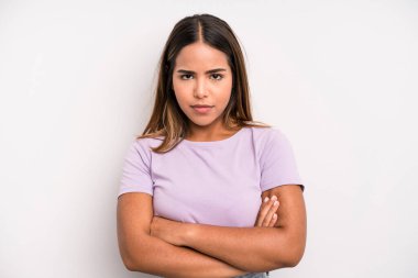 hispanic latin pretty woman feeling displeased and disappointed, looking serious, annoyed and angry with crossed arms