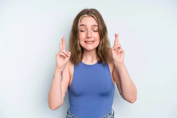 Caucasian Pretty Woman Smiling Anxiously Crossing Both Fingers Feeling Worried — Stockfoto