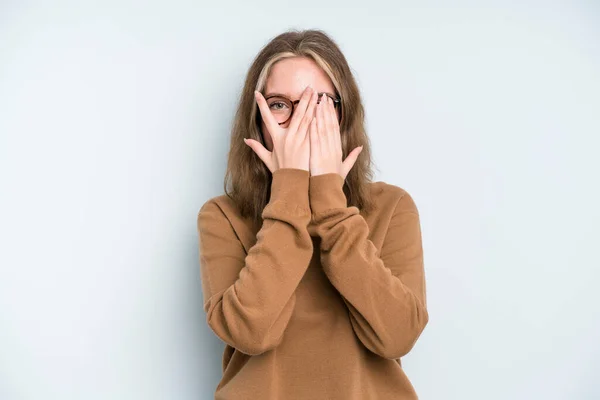 Caucasian Pretty Woman Covering Face Hands Peeking Fingers Surprised Expression — Stok fotoğraf