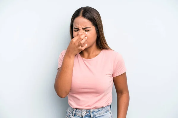 Hispanic Latin Pretty Woman Feeling Disgusted Holding Nose Avoid Smelling — Stok fotoğraf