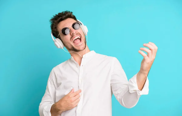 Young Handsome Man Isolated Listening Music Dancing His Headphones — Stock Photo, Image