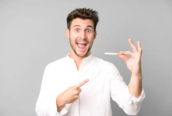 Young Handsome Man Isolated Holding Cigarette — Stock Photo, Image