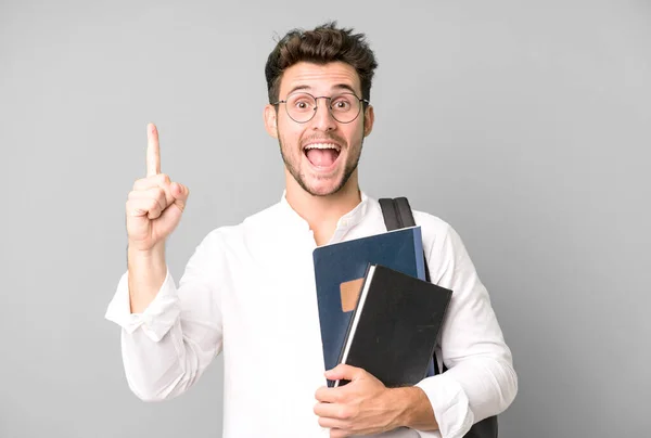 Joven Hombre Guapo Aislado Con Una Bolsa Libros Concepto Estudiante — Foto de Stock