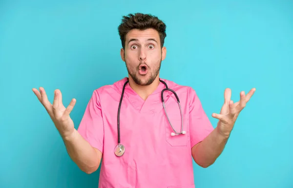 Handsome Teenager Feeling Extremely Shocked Surprised Nurse Concept — Stock Photo, Image