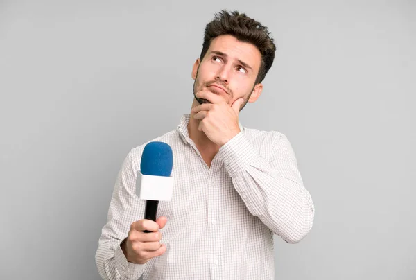 Handsome Teenager Thinking Feeling Doubtful Confused Microphone Persenter Concept — Stock Photo, Image